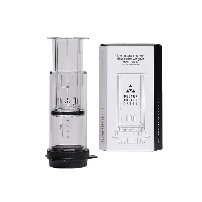 Danes Coffee Roasters Delter Coffee Press brewing equipment with stainless steel and plastic components for fresh coffee brewing.