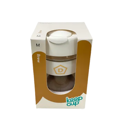 Danes KeepCup merchandise with a clear view of the reusable coffee cup featuring the Danes Coffee Roasters logo.