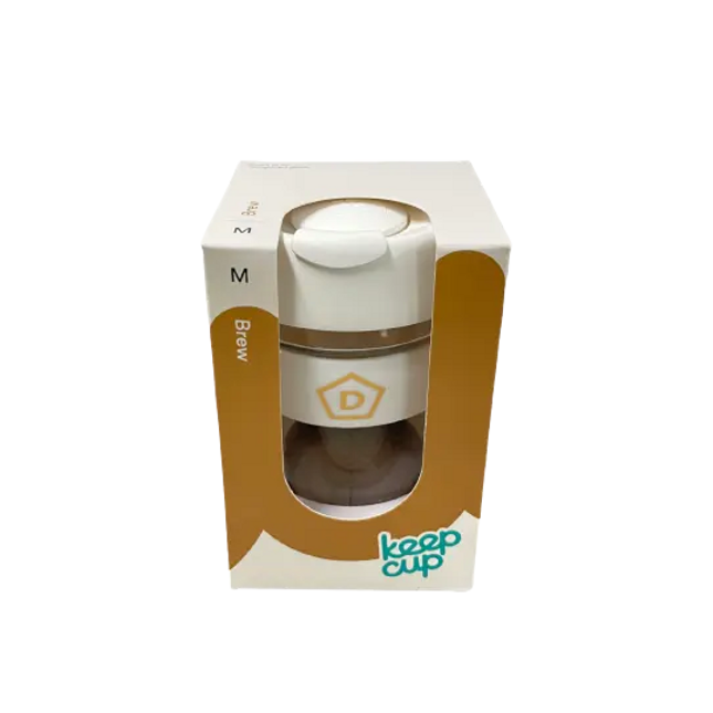 Danes KeepCup merchandise with a clear view of the reusable coffee cup featuring the Danes Coffee Roasters logo.